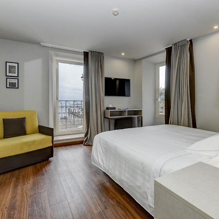 Hotel Tripoli เดเซนซาโนเดลการ์ดา ภายนอก รูปภาพ